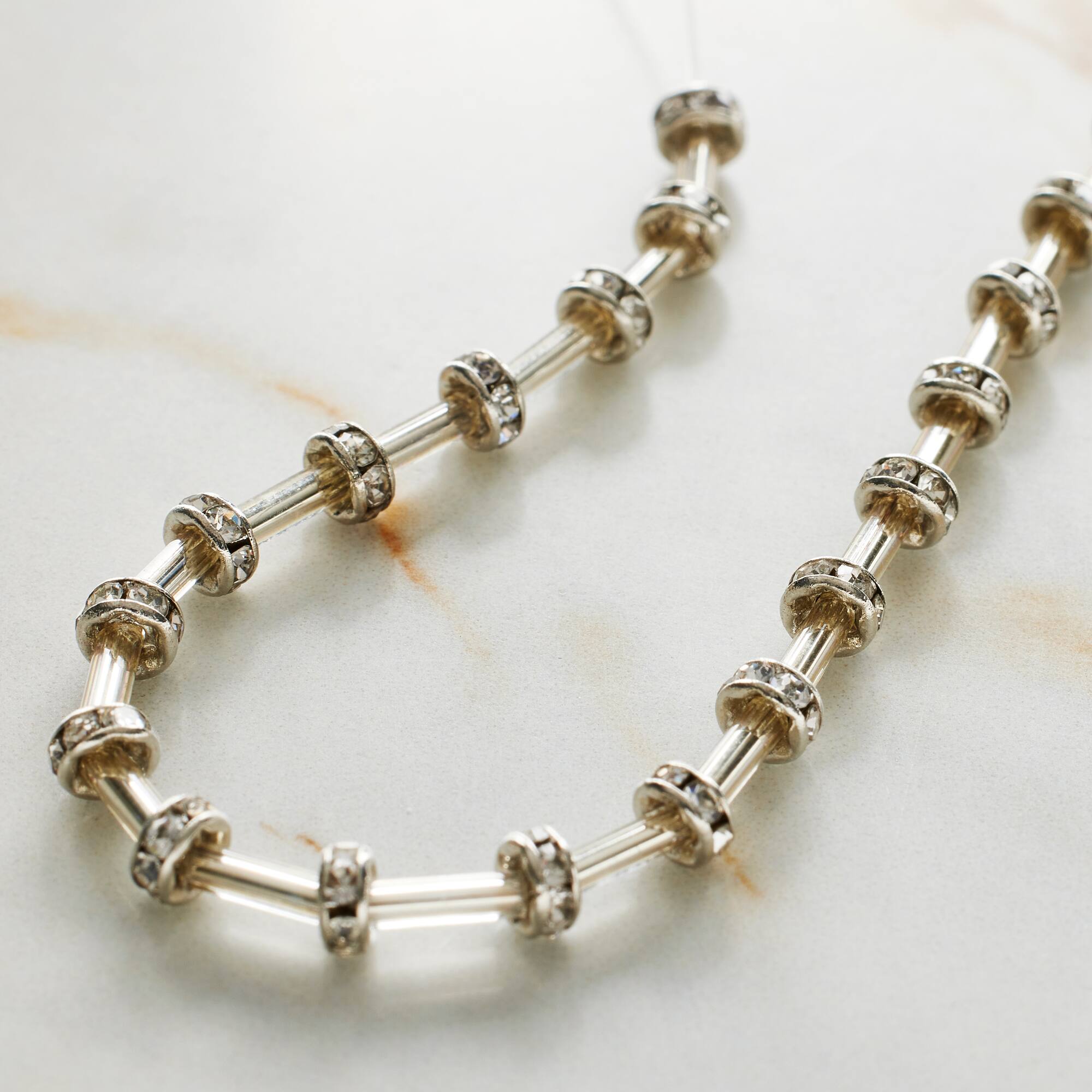 Silver Rhinestone Studded Rondel Beads, 4mm by Bead Landing™